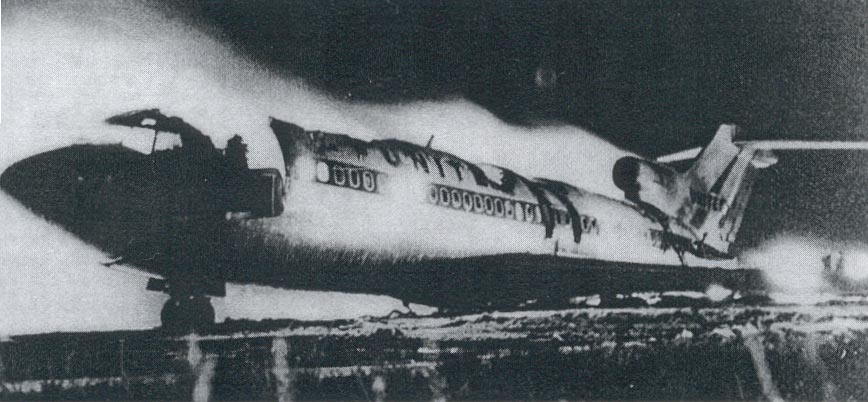 A picture containing text, outdoor, old, transport

Description automatically generated
