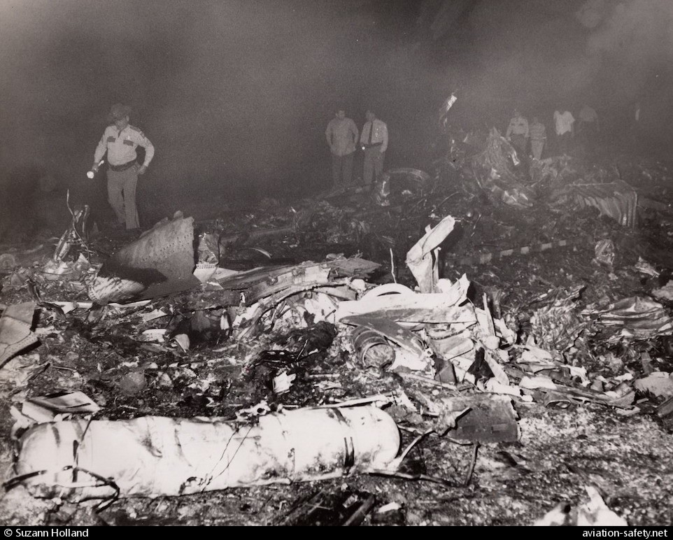 Douglas DC-8-51 | Delta airlines | N802E | picture of crashsite with officials searching the debris with torches