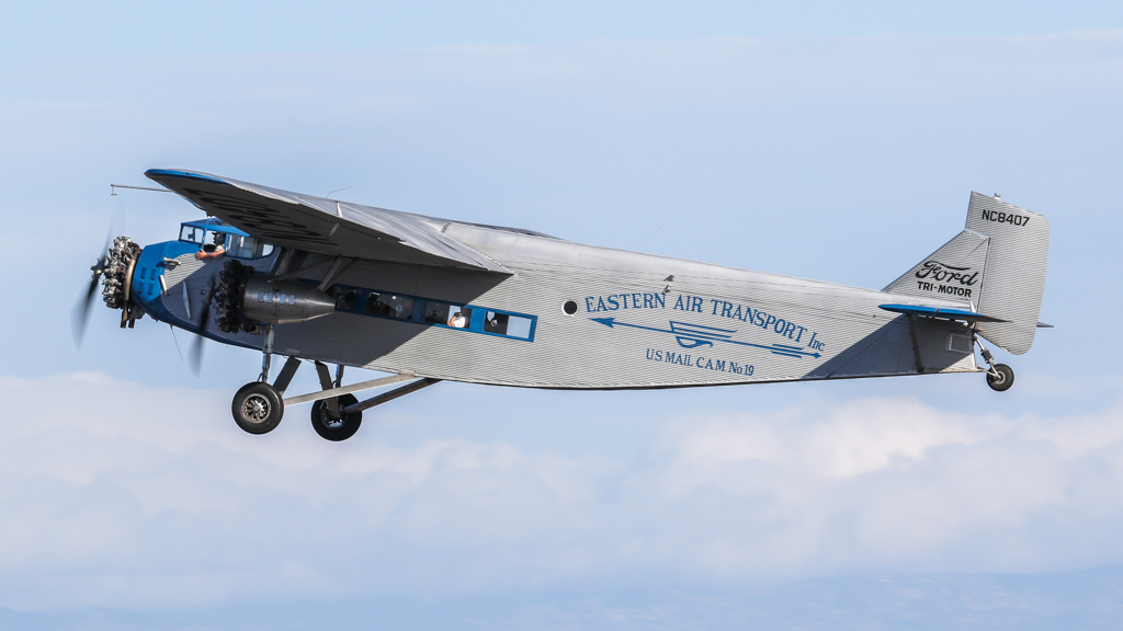 EAA Ford 4-AT-E Tri-Motor N8407 | Climbing out. Note that th | Flickr